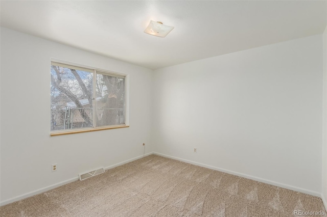 view of carpeted spare room