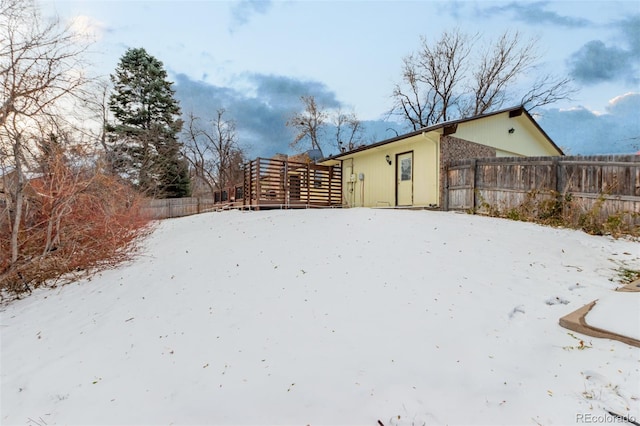 view of yard covered in snow