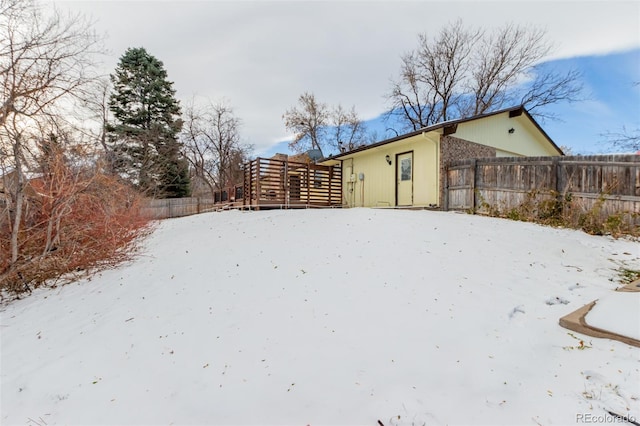 view of yard covered in snow