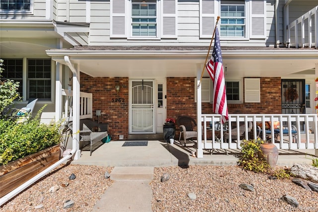 entrance to property with covered porch