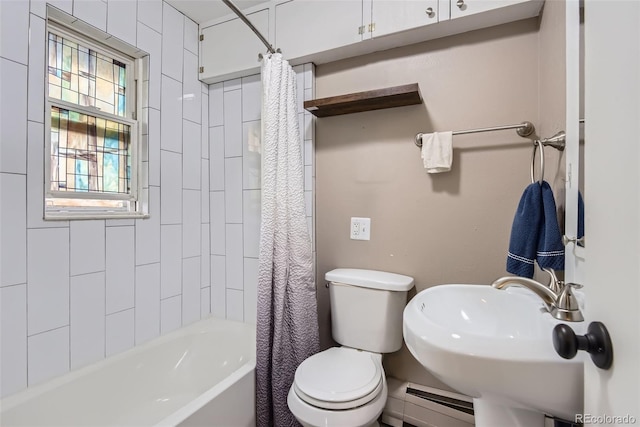 3930 S Sherman St, Englewood, CO 80113 - full bathroom featuring a baseboard radiator, toilet, shower / bathtub combination with curtain, and a sink