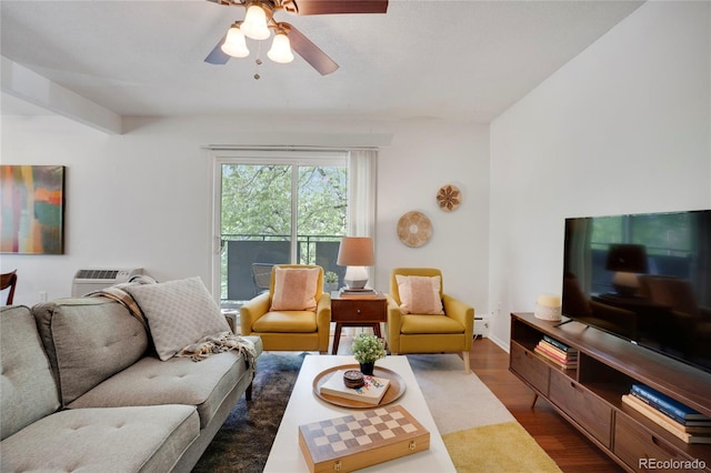 1201 Race St Unit 10, Denver, CO 80206 - living area featuring dark wood finished floors, ceiling fan, an AC wall unit, and a baseboard heating unit