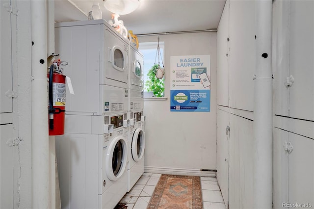 1201 Race St Unit 10, Denver, CO 80206 - shared laundry with stacked washer and clothes dryer, independent washer and dryer, and light tile patterned flooring