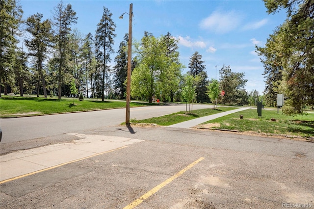 1201 Race St Unit 10, Denver, CO 80206 - view of asphalt street with view of scattered trees and street lighting