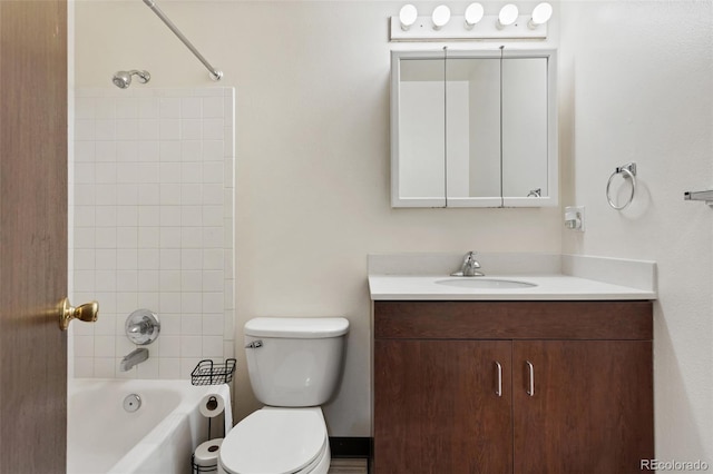 6650 E Arizona Ave Unit 203, Denver, CO 80224 - bathroom featuring toilet, vanity, and bathtub / shower combination