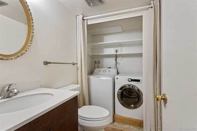 6650 E Arizona Ave Unit 203, Denver, CO 80224 - bathroom with vanity and toilet