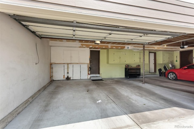 6650 E Arizona Ave Unit 203, Denver, CO 80224 - garage with a garage door opener