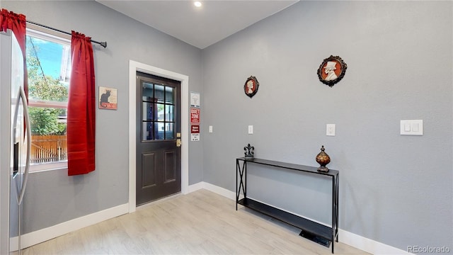 foyer entrance featuring light hardwood / wood-style flooring