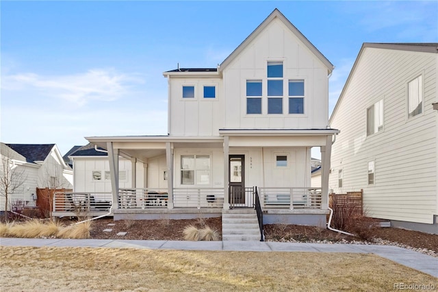 modern farmhouse style home with a porch and board and batten siding