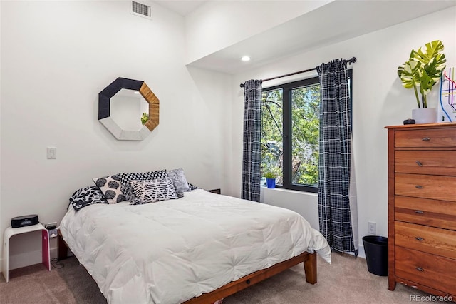 bedroom featuring recessed lighting, carpet, and visible vents
