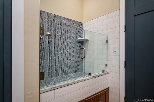 bathroom with an enclosed shower