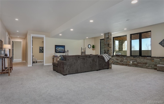 living room featuring light carpet