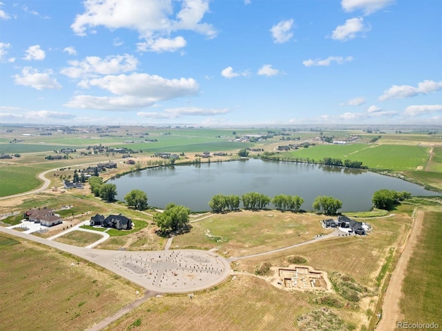 aerial view with a water view and a rural view