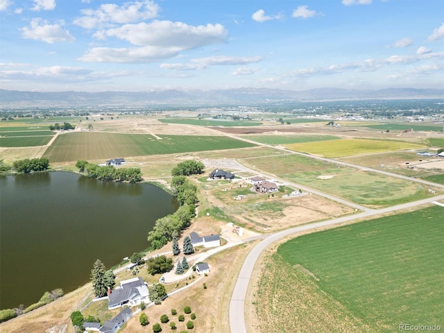 bird's eye view featuring a rural view and a water and mountain view