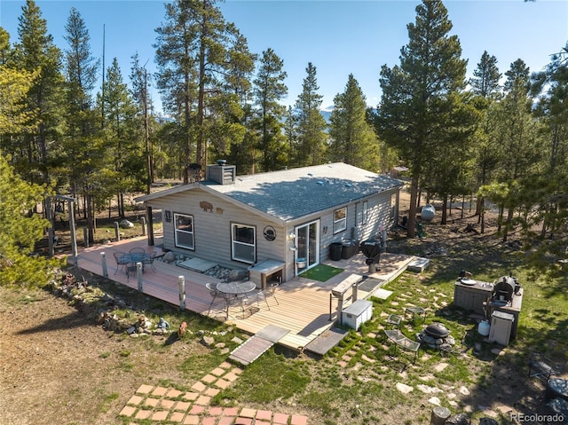 246 Spruce Dr, Twin Lakes, CO 81251 - back of house with a deck and a chimney