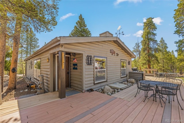 246 Spruce Dr, Twin Lakes, CO 81251 - wooden terrace featuring outdoor dining area and an outdoor structure