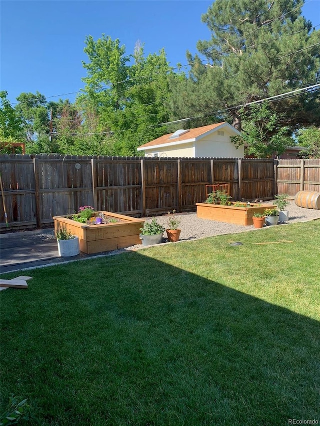 6614 Everett St, Arvada, CO 80004 - view of yard featuring a garden