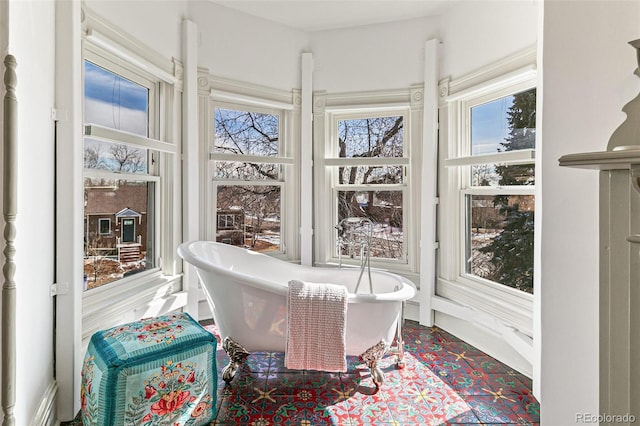 sunroom featuring a healthy amount of sunlight