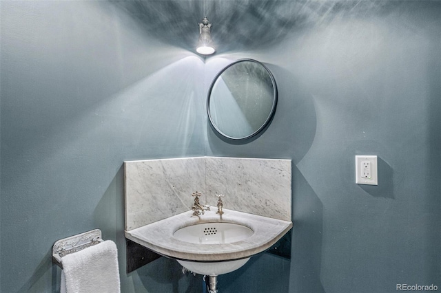 bathroom with tasteful backsplash