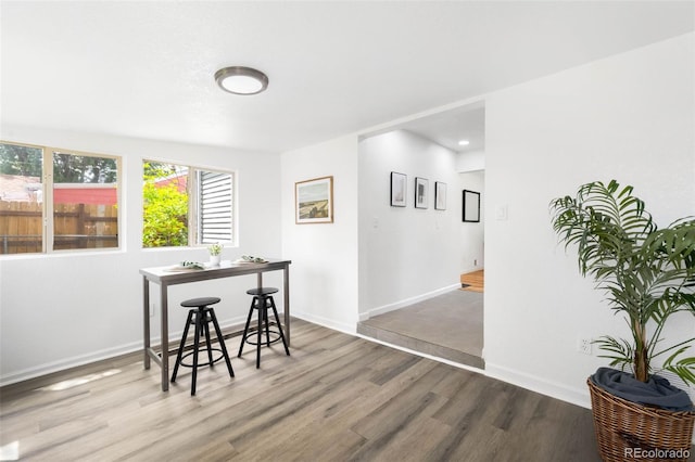 1180 Newark St, Aurora, CO 80010 - dining area featuring wood finished floors, baseboards, and recessed lighting