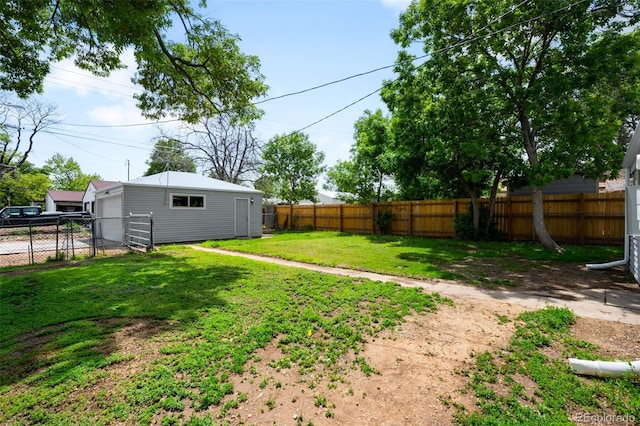 1180 Newark St, Aurora, CO 80010 - view of yard featuring an outdoor structure