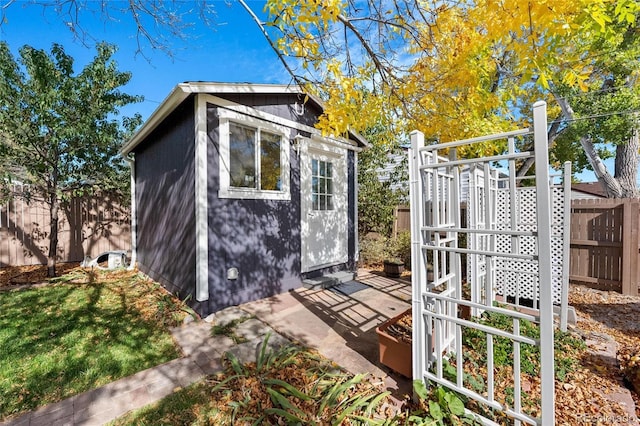 view of shed with a fenced backyard