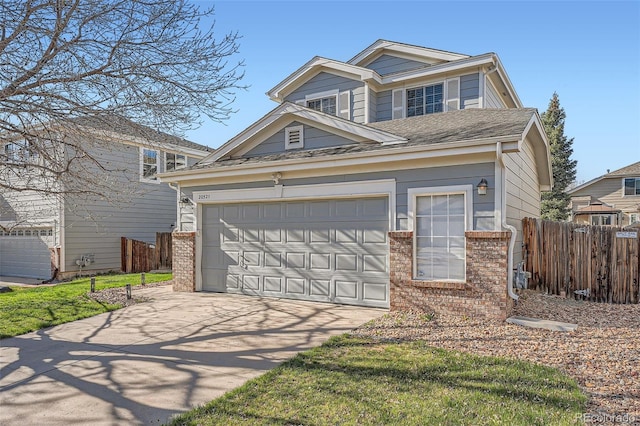 20521 E Bellewood Pl, Aurora, CO 80015 - traditional-style house featuring driveway and brick siding