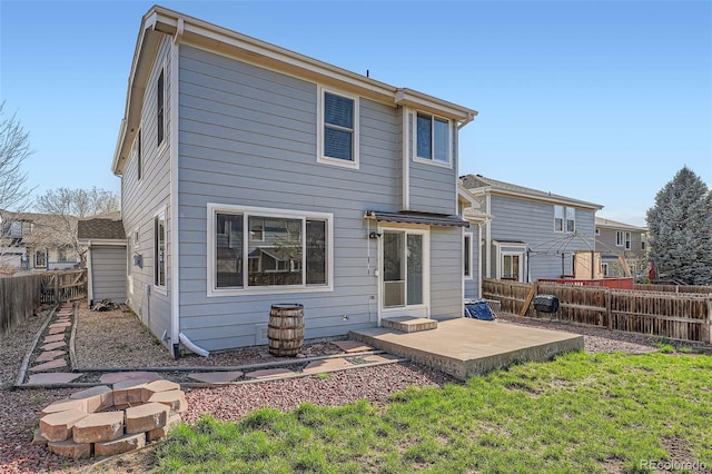 20521 E Bellewood Pl, Aurora, CO 80015 - rear view of property featuring a patio and a fenced backyard