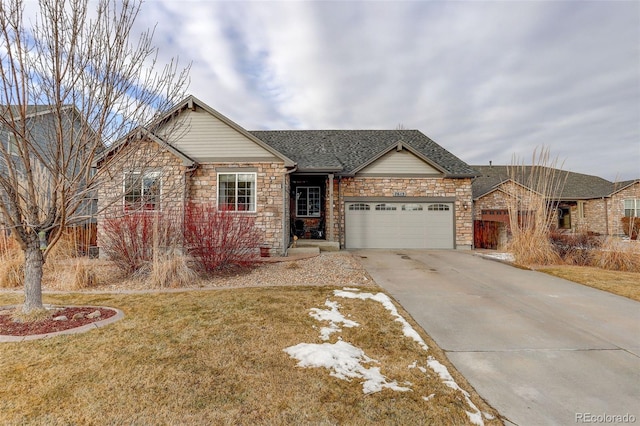 ranch-style home with a garage and a front lawn