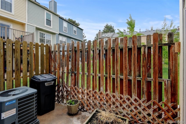 9188 W Ontario Dr, Littleton, CO 80128 - view of patio with fence and central air condition unit