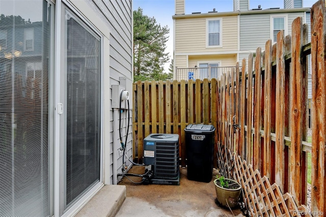 9188 W Ontario Dr, Littleton, CO 80128 - view of patio / terrace with cooling unit and fence
