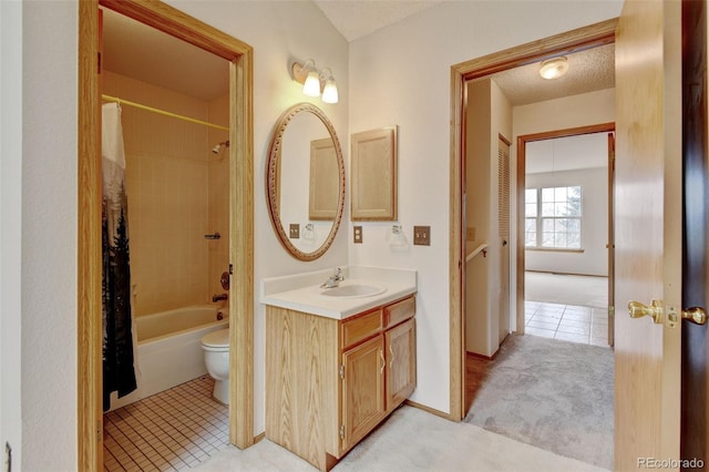 9188 W Ontario Dr, Littleton, CO 80128 - full bathroom with tile patterned flooring, vanity, toilet, shower / bath combo with shower curtain, and a textured ceiling