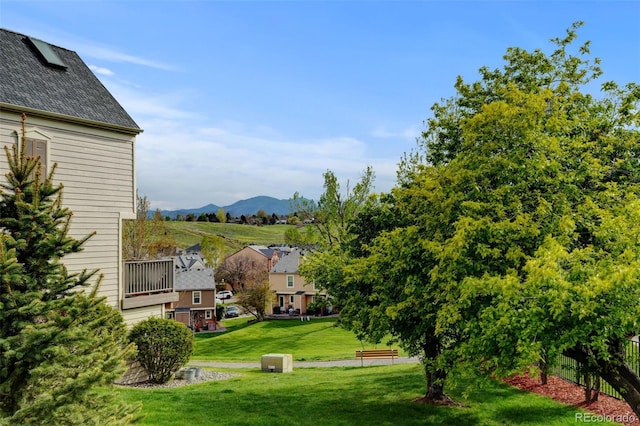 9188 W Ontario Dr, Littleton, CO 80128 - view of green lawn featuring a mountain view and a residential view
