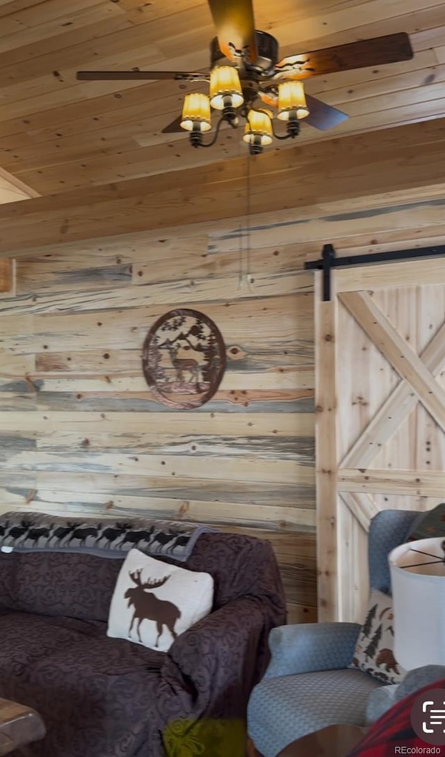 1106 Hull Ave, Westcliffe, CO 81252 - living area featuring wooden walls, wood ceiling, a chandelier, and a barn door