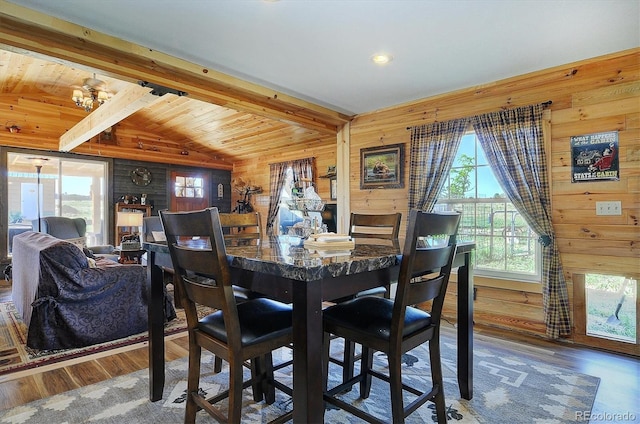 1106 Hull Ave, Westcliffe, CO 81252 - dining room featuring wooden walls, wood finished floors, and a chandelier
