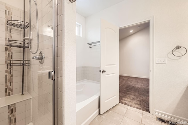 full bathroom featuring a garden tub, tile patterned flooring, visible vents, and a stall shower