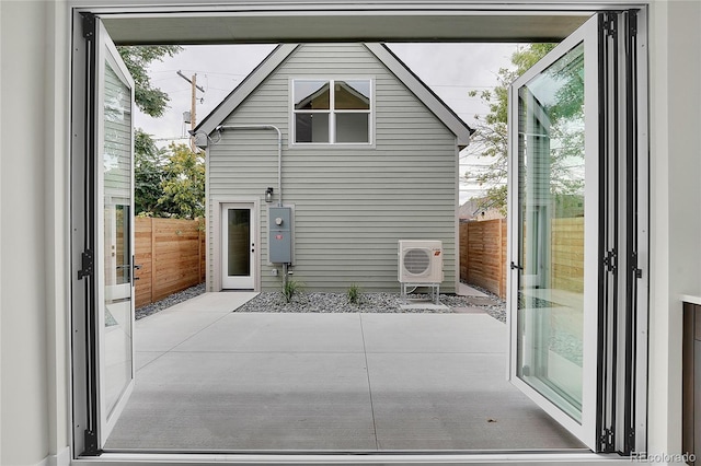 671 Elati St, Denver, CO 80204 - rear view of property with a patio and a cooling unit