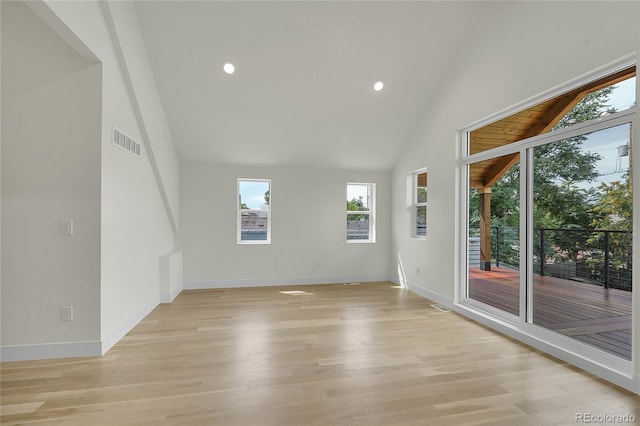 671 Elati St, Denver, CO 80204 - unfurnished room with light wood-style floors, recessed lighting, high vaulted ceiling, and baseboards