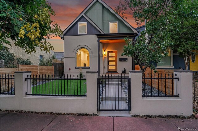 671 Elati St, Denver, CO 80204 - view of front of house with stucco siding