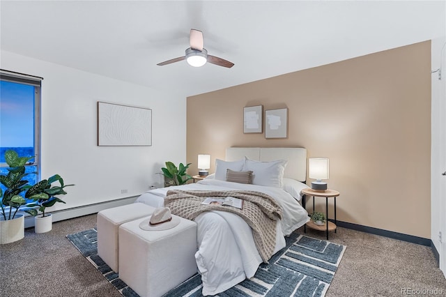 bedroom featuring ceiling fan, a baseboard radiator, and baseboards