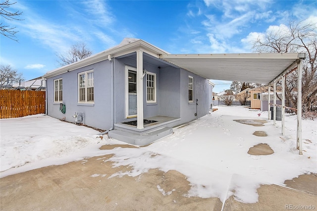 view of snow covered property