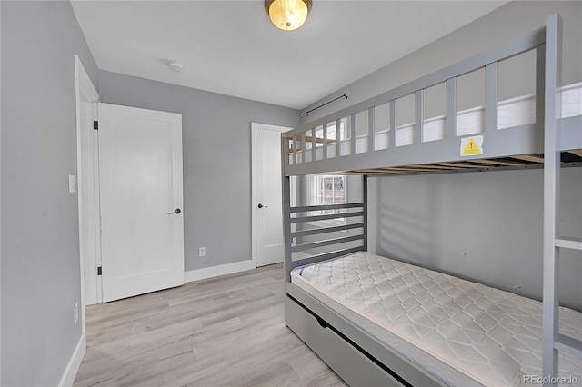 bedroom featuring light wood-type flooring