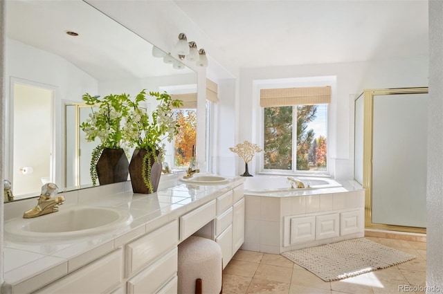 bathroom with vanity, lofted ceiling, separate shower and tub, and tile patterned flooring