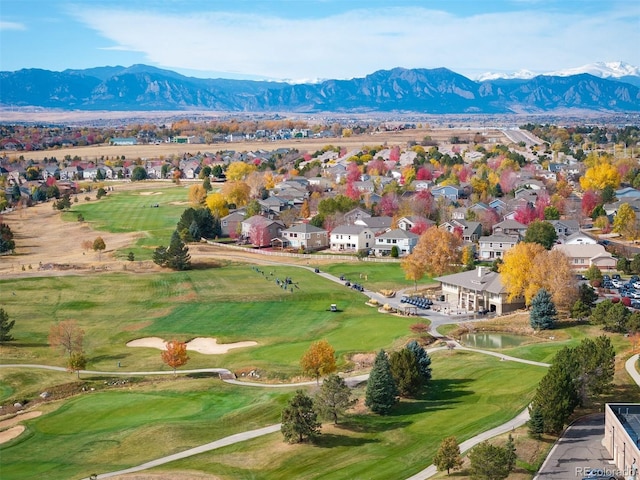 bird's eye view with a mountain view, golf course view, and a residential view