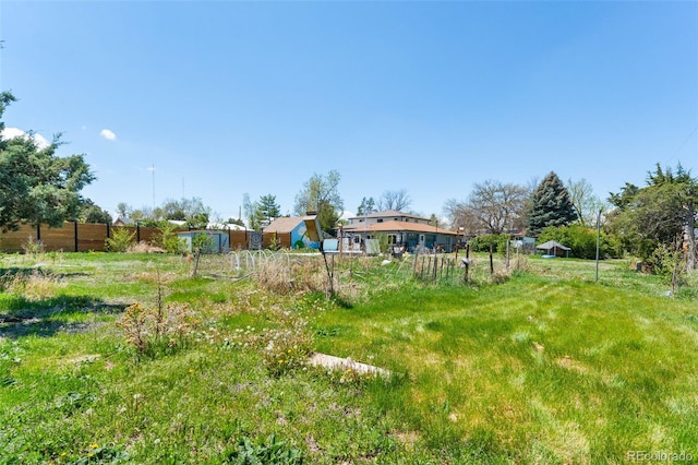 view of yard featuring fence