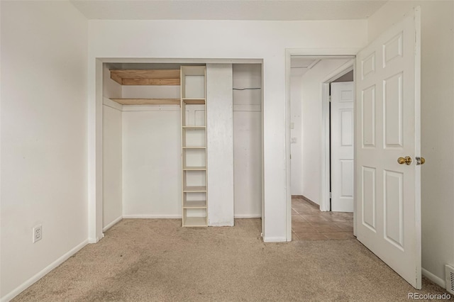 9832 High St, Thornton, CO 80229 - unfurnished bedroom with carpet, a closet, and baseboards