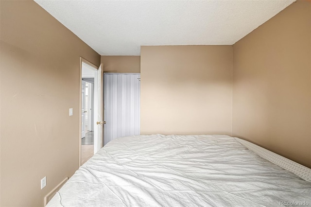 9832 High St, Thornton, CO 80229 - bedroom featuring a textured ceiling