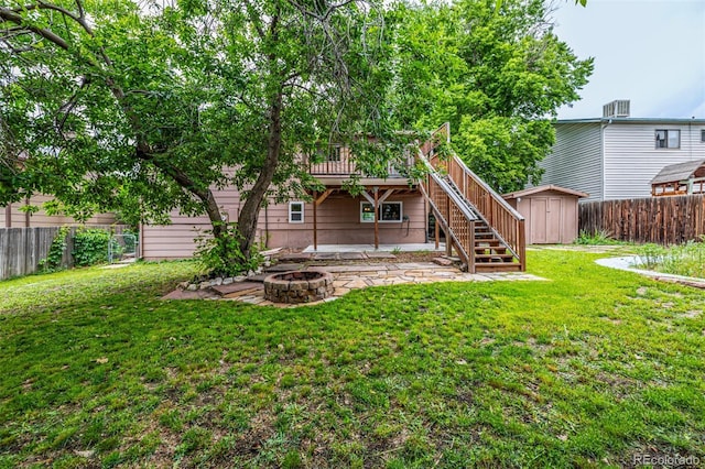 9832 High St, Thornton, CO 80229 - rear view of property with an outdoor fire pit, stairs, a patio, and a wooden deck