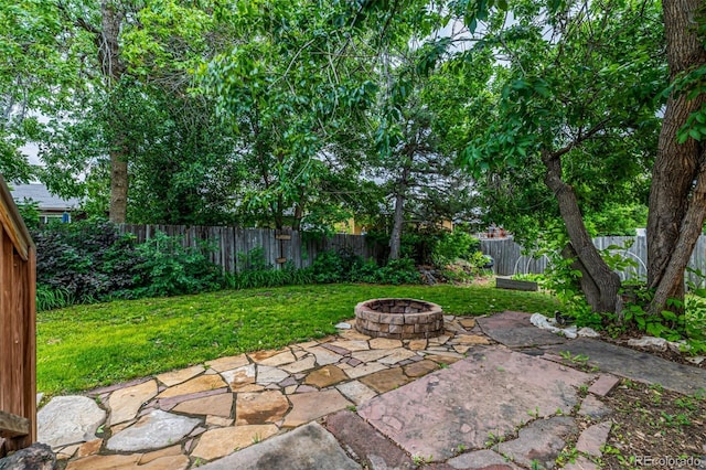 9832 High St, Thornton, CO 80229 - view of patio / terrace featuring an outdoor fire pit