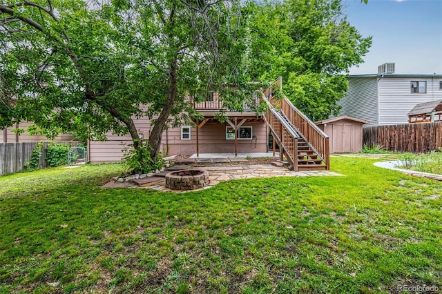 9832 High St, Thornton, CO 80229 - rear view of property featuring a fire pit, stairs, a patio area, and a deck